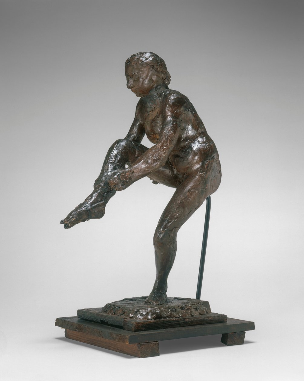 Dancer Putting on Her Stocking, 1890s-1911 by Edgar Degas