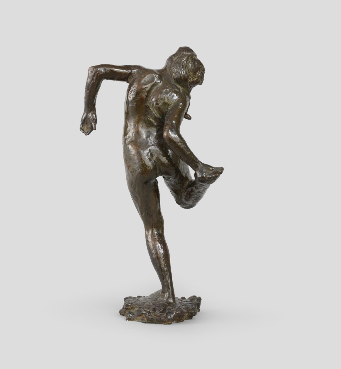 Dancer looking at the sole of her right foot, 1895-1902 by Edgar Degas