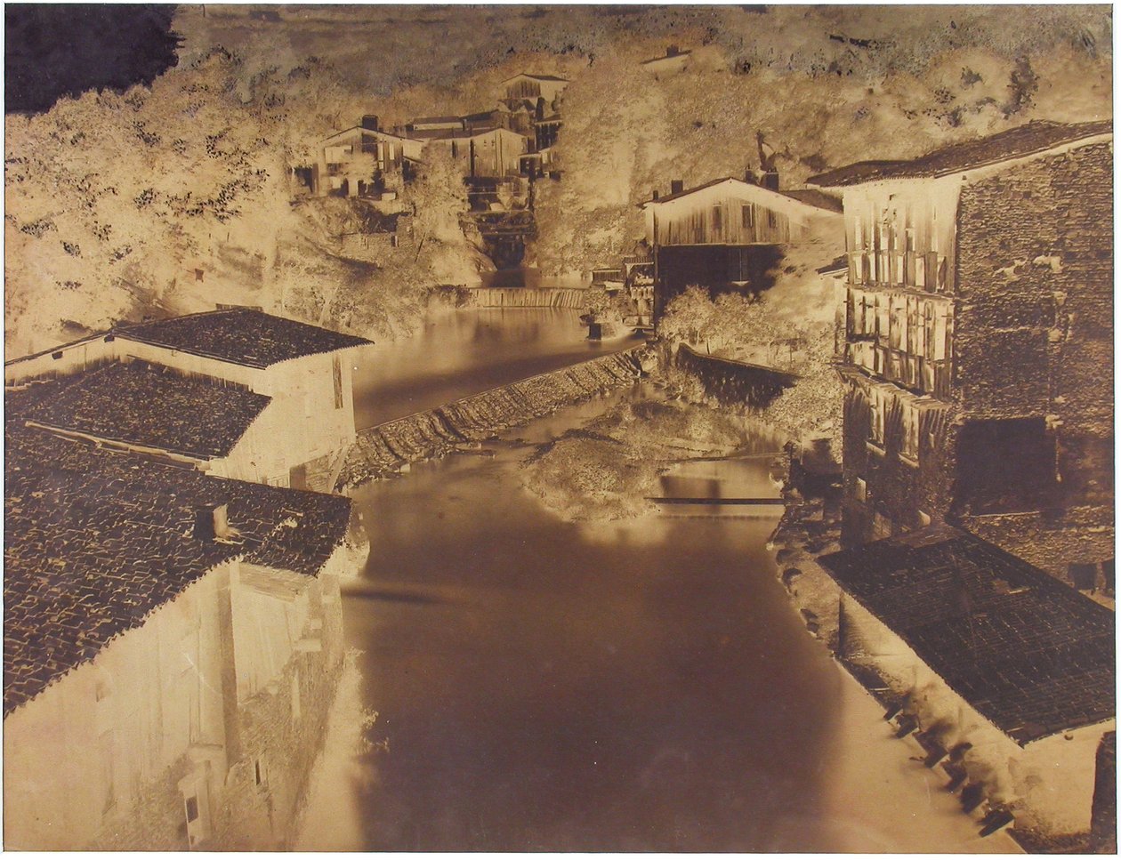 Untitled [houses by a river, possibly Italy or France], 1854 by Édouard Baldus