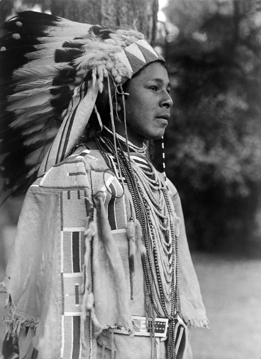 Youth in holiday costume, Umatilla, photo Edward S. Curtis by Edward Sheriff Curtis