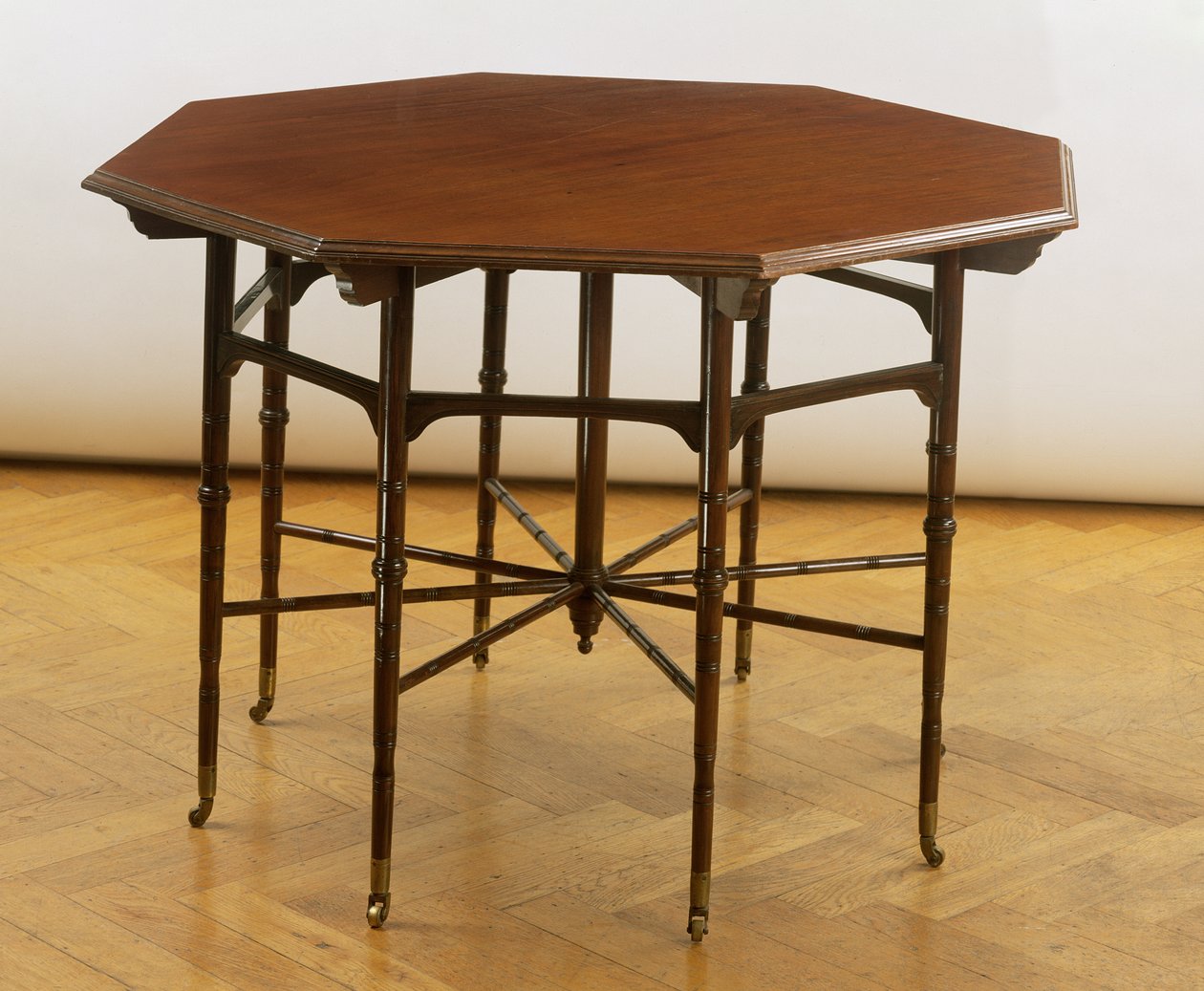 Octagonal table, manufactured by Collinson and Lock by Edward William Godwin