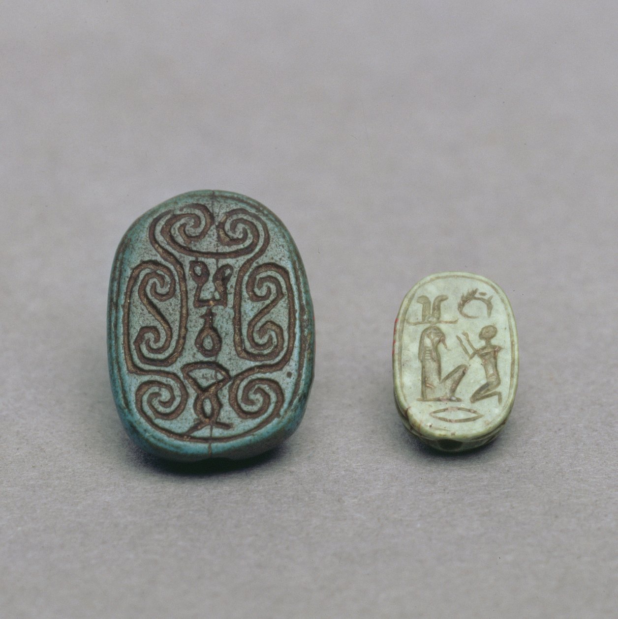 Egyptian faience scarab amulet, Second Intermediate Period; green feldspar scarab amulet, Late Period by Egyptian