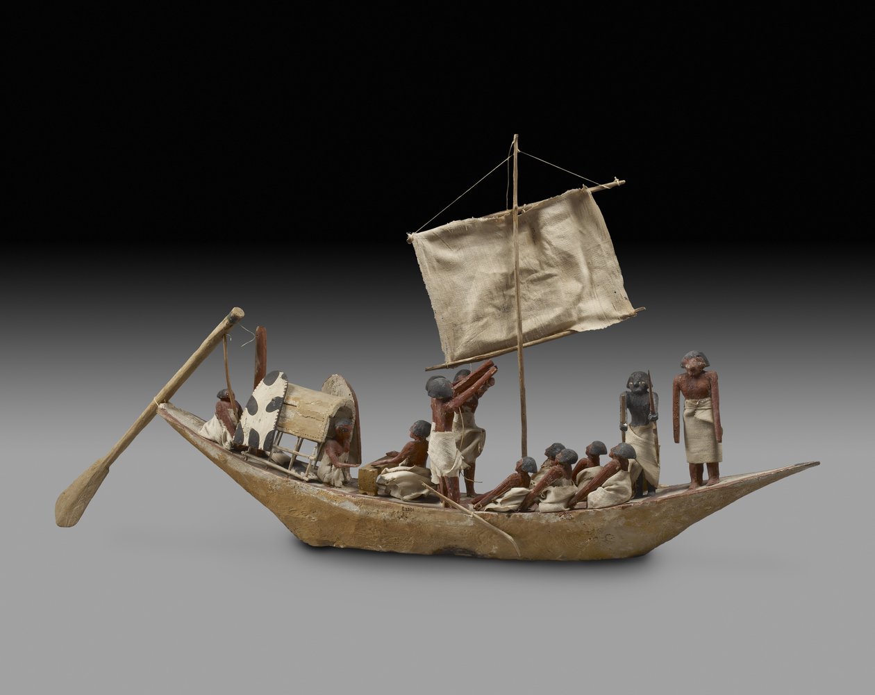 Model war boat with sail, oars and 14 figures, 9th-11th Dynasty (c.2125-1940) by Egyptian