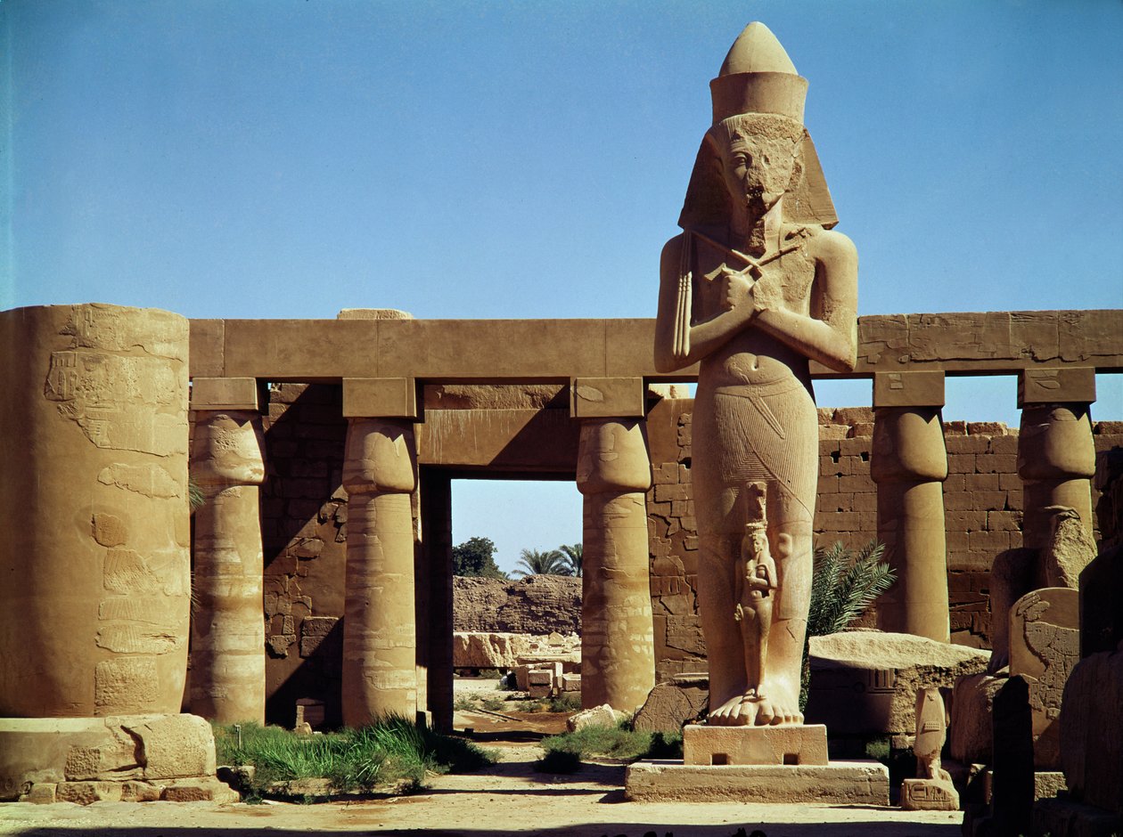 The Colossus of Ramesses II: standing statue of the king with his daughter Benta Anta by Egyptian 19th Dynasty