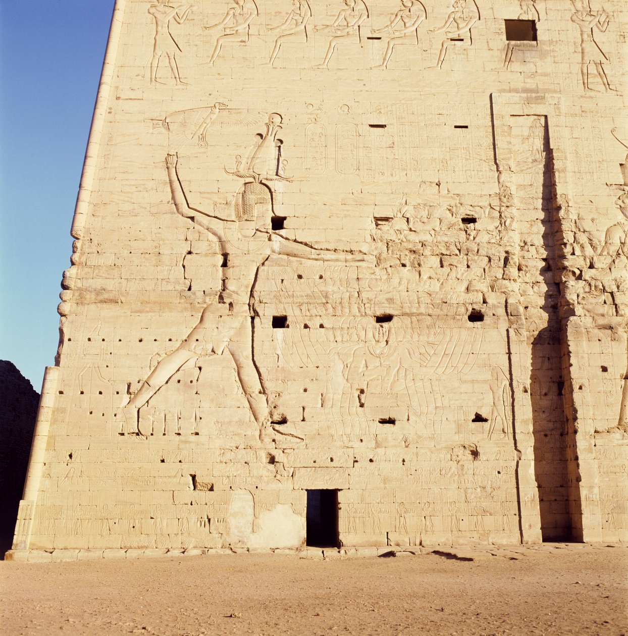 Ptolemy XII Smiting His Enemies from the Entrance Pylon of the Temple of Horus by Egyptian Ptolemaic Period