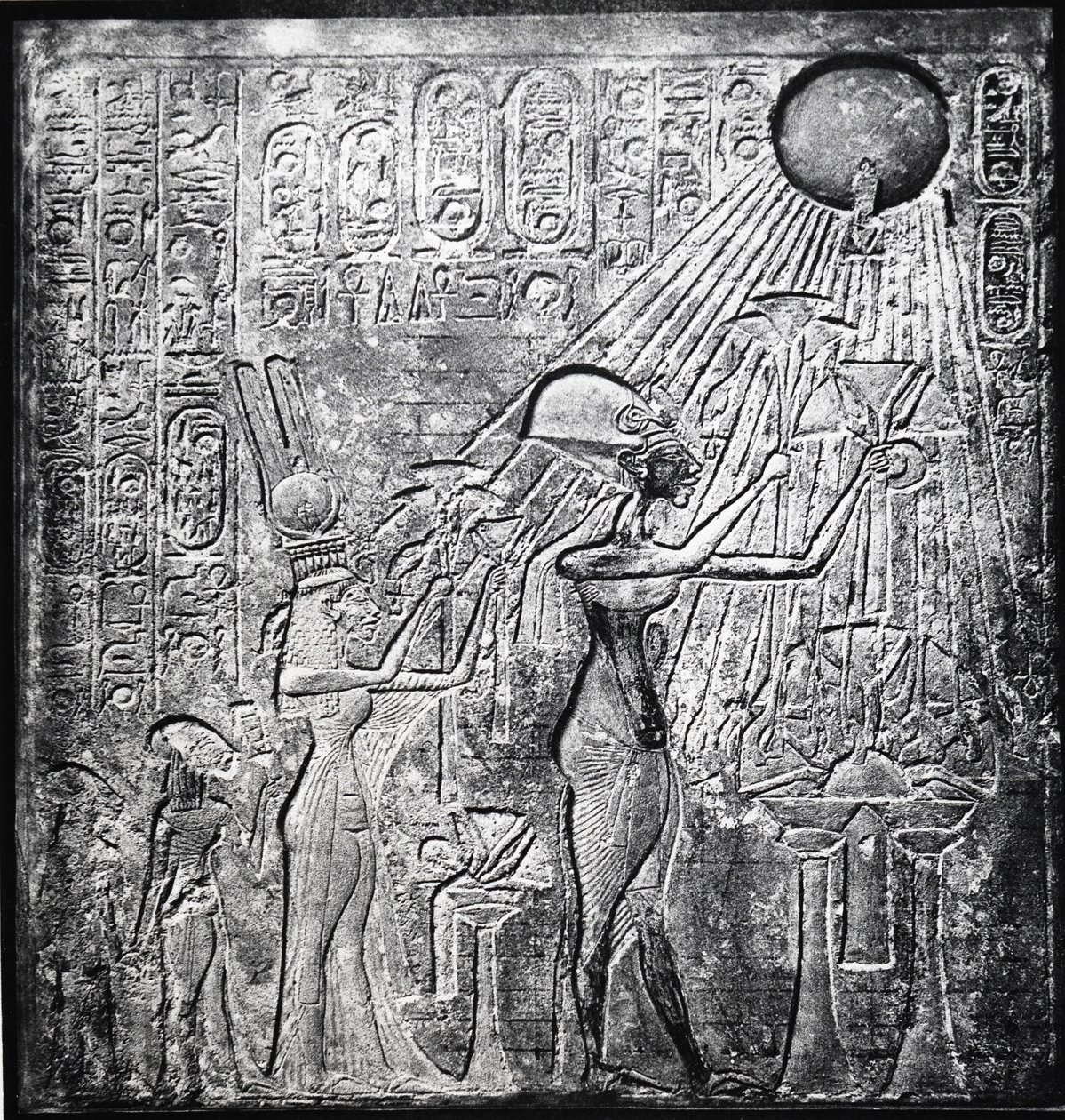 Akhenaten (Amenhotep IV) heretic pharaoh, reigned from c150 BC, here with Nefertiti and their two daughters offering gifts to the Sun. Relief originally in Temple of Sun, Thebes by Egyptian 18th Dynasty