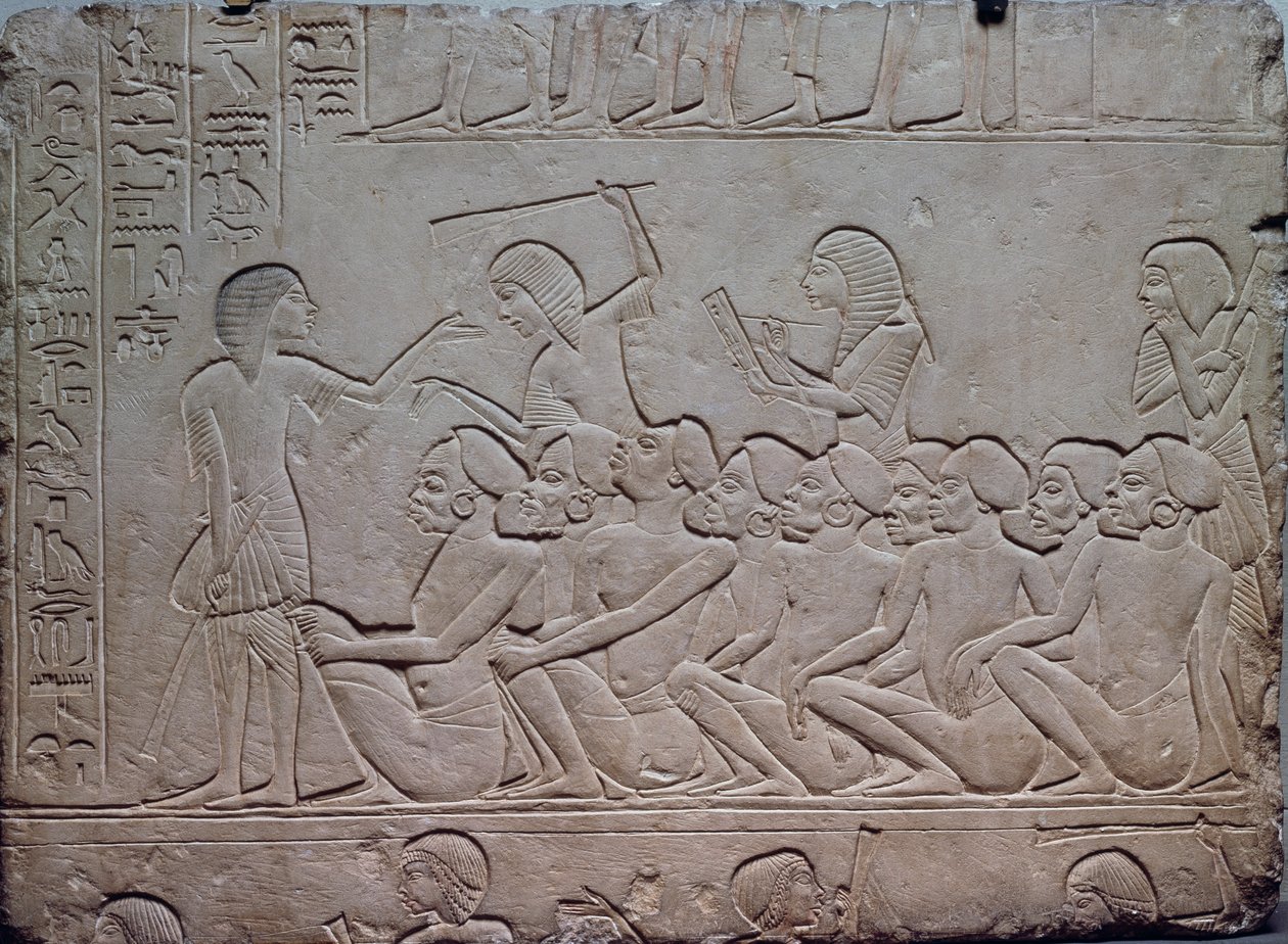 Black prisoners surrounded by armed guards, relief from the Memphite Tomb of Horemheb at Saqqara, Egyptian Civilization, New Kingdom, Dynasty XVIII by Egyptian 18th Dynasty