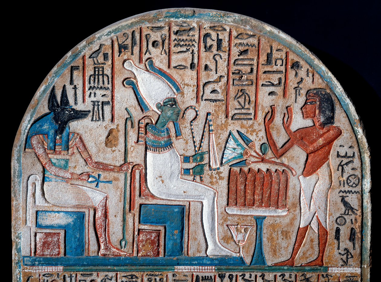 Egyptian antiquity: Nanai stele representing worshipping Osiris and Anubis, deity of the dead who holds the key of life in the shape of an Ankh. Painted limestone. End of the 18th dynasty. 14th century BC. Turin, Egyptian Museum by Egyptian 18th Dynasty