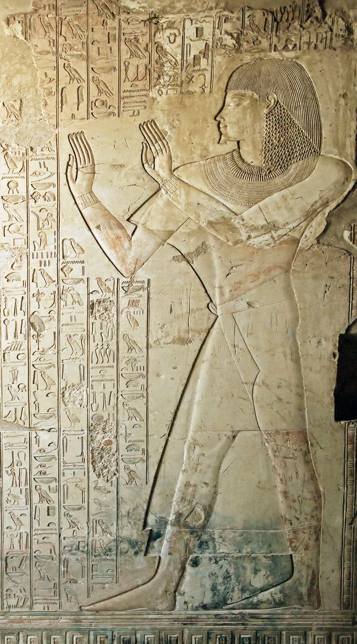 Egyptian antiquity: relief from the tomb of Kha em Het, inspector of attics and scribe at the court of Amenophis III the representative leaving the tomb in prayer. 18th dynasty. Luxor, West Bank, Egypt by Egyptian 18th Dynasty
