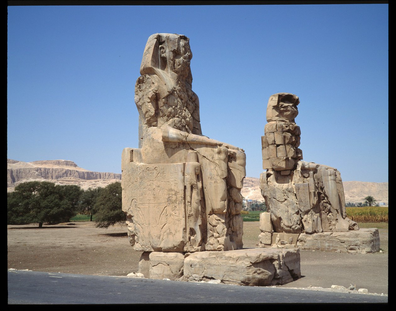 View of the Colossus of Memnon, Period of Amenophis III, New Empire by Egyptian 18th Dynasty