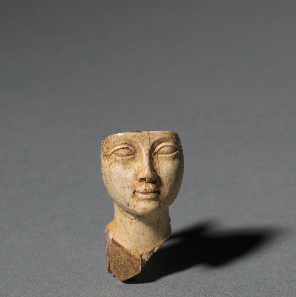 Face from a Cosmetic Spoon by Egyptian 18th Dynasty