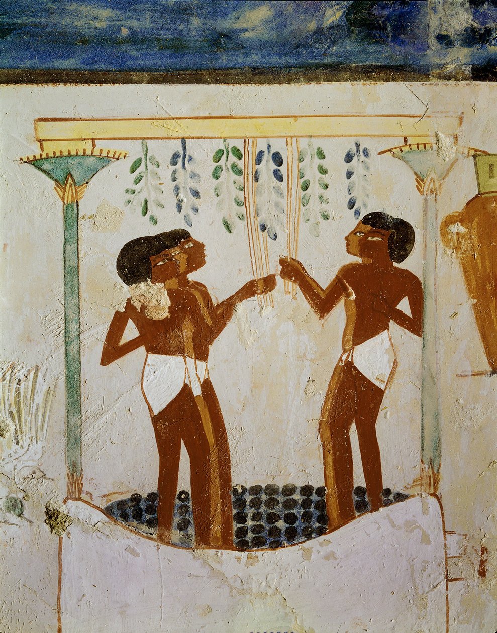 Men trampling grapes, one racking must by Egyptian 18th Dynasty