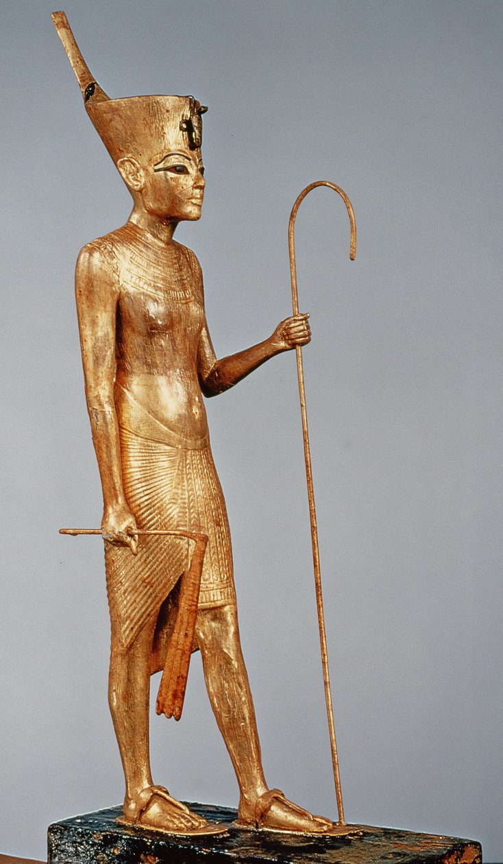 Statuette of the king wearing the red crown of the north, from the tomb of Tutankhamun by Egyptian 18th Dynasty