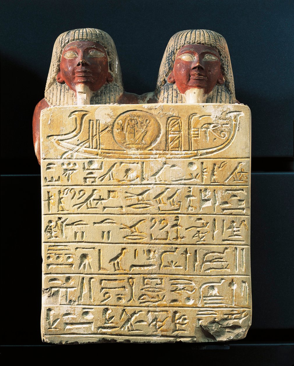 Limestone stele of Dydy and his son Pendua, master carpenters, offering hymn to the sun god Ra, from Deir el-Medina by Egyptian 19th Dynasty
