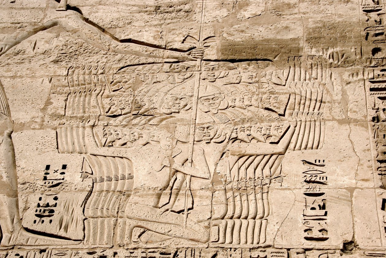Detail of the reliefs of the first pylon representing the capture of fighters belonging to the peoples of the sea, enemies of Ramses III. Funeral Temple of Ramses III, Luxor, Medinet Habou, Egypt by Egyptian 20th Dynasty