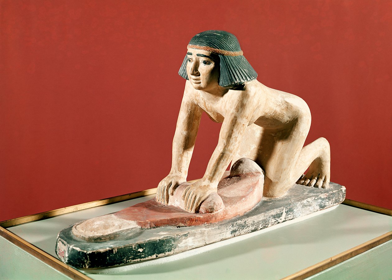 Model of a woman grinding grain, Old Kingdom by Egyptian 5th Dynasty