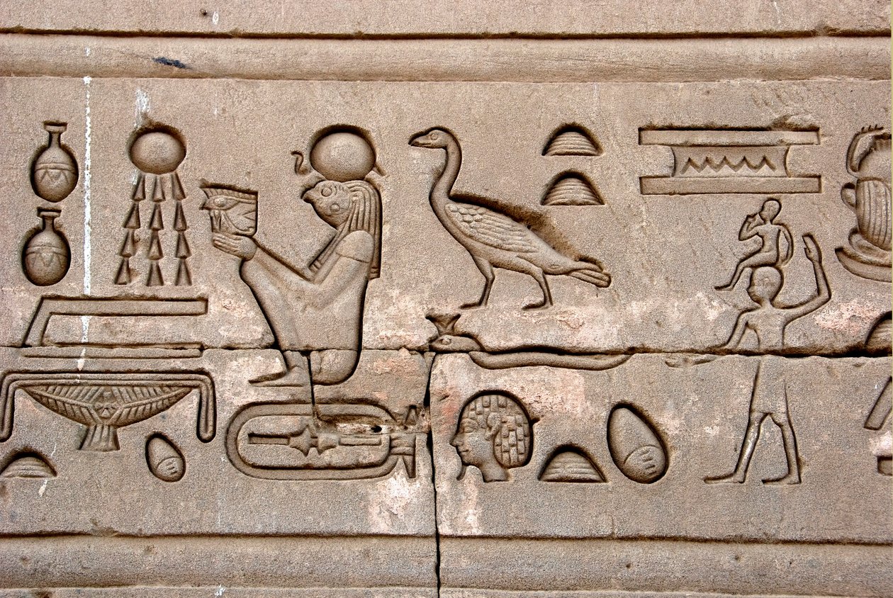 Egyptian antiquity: hieroglyphs on the eastern wall of Hathor Temple, Denderah, Egypt by Egyptian Ptolemaic Period