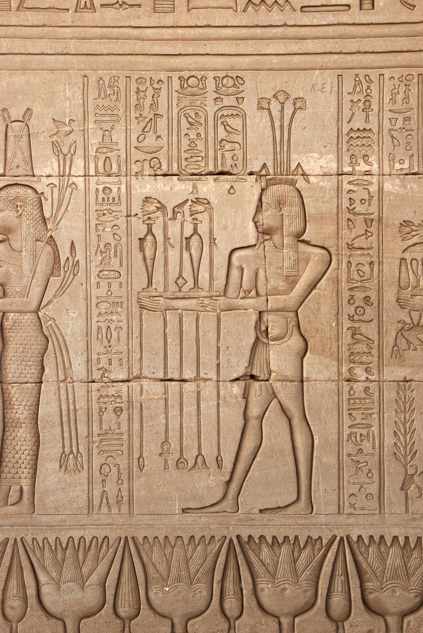 Egyptian antiquity: representation of a man bringing offerings as homage to the goddess, Temple of Hathor, Denderah, Egypt by Egyptian Ptolemaic Period