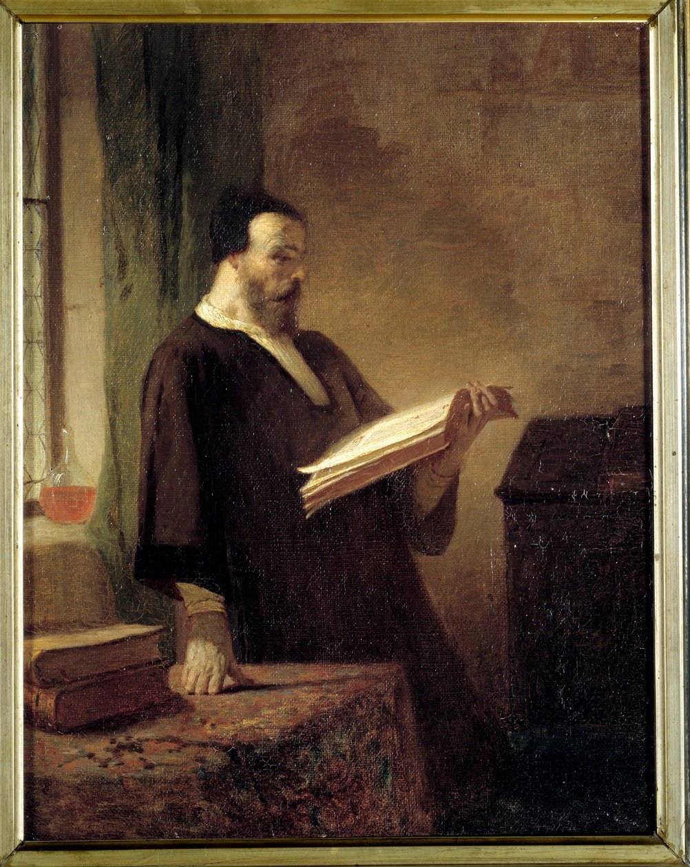 A bibliophile A man reading a book by Emile Vaude