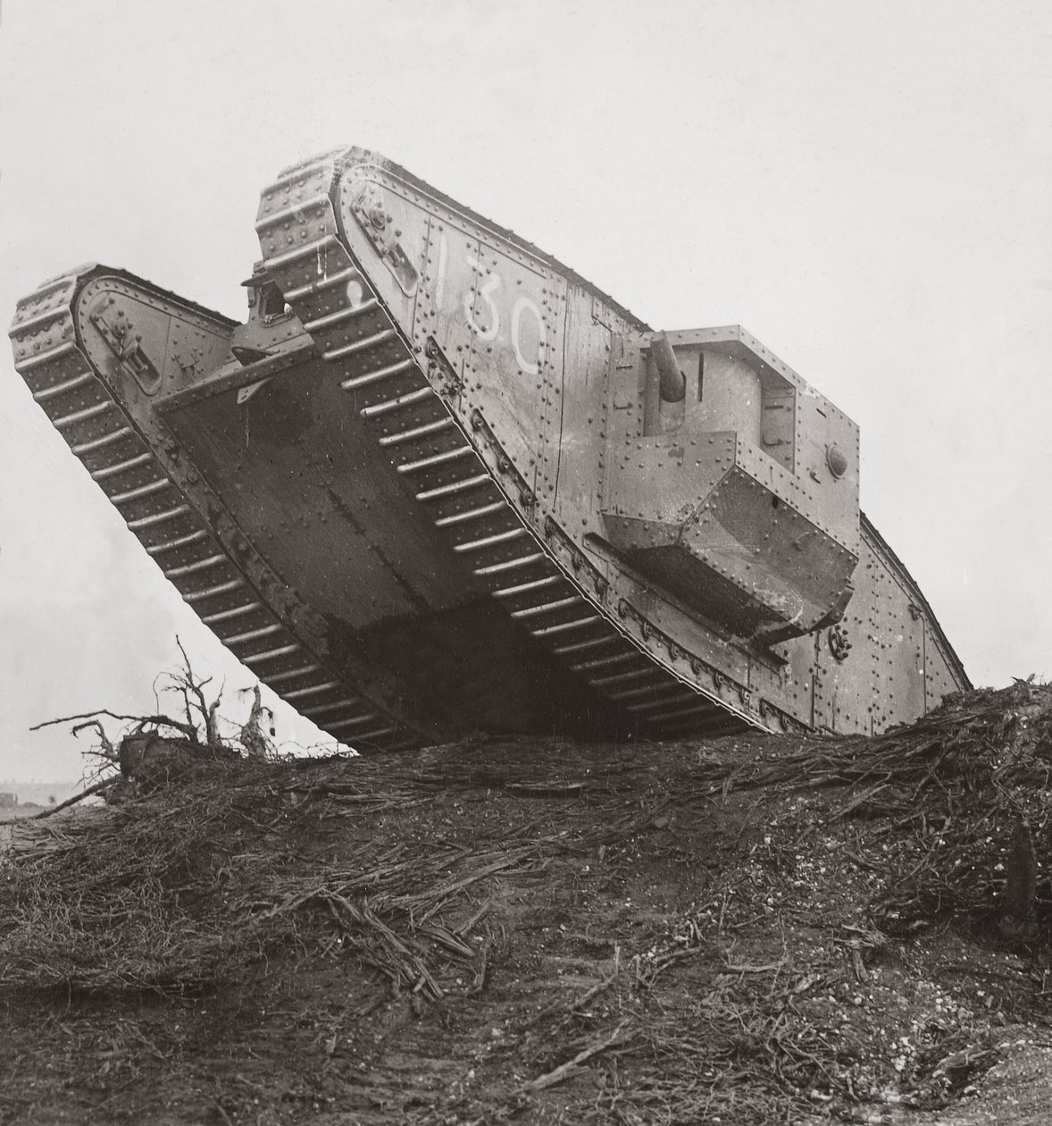A Tank Leads the Infantry into Action and Breaks Down the Wire Entanglements by English Photographer