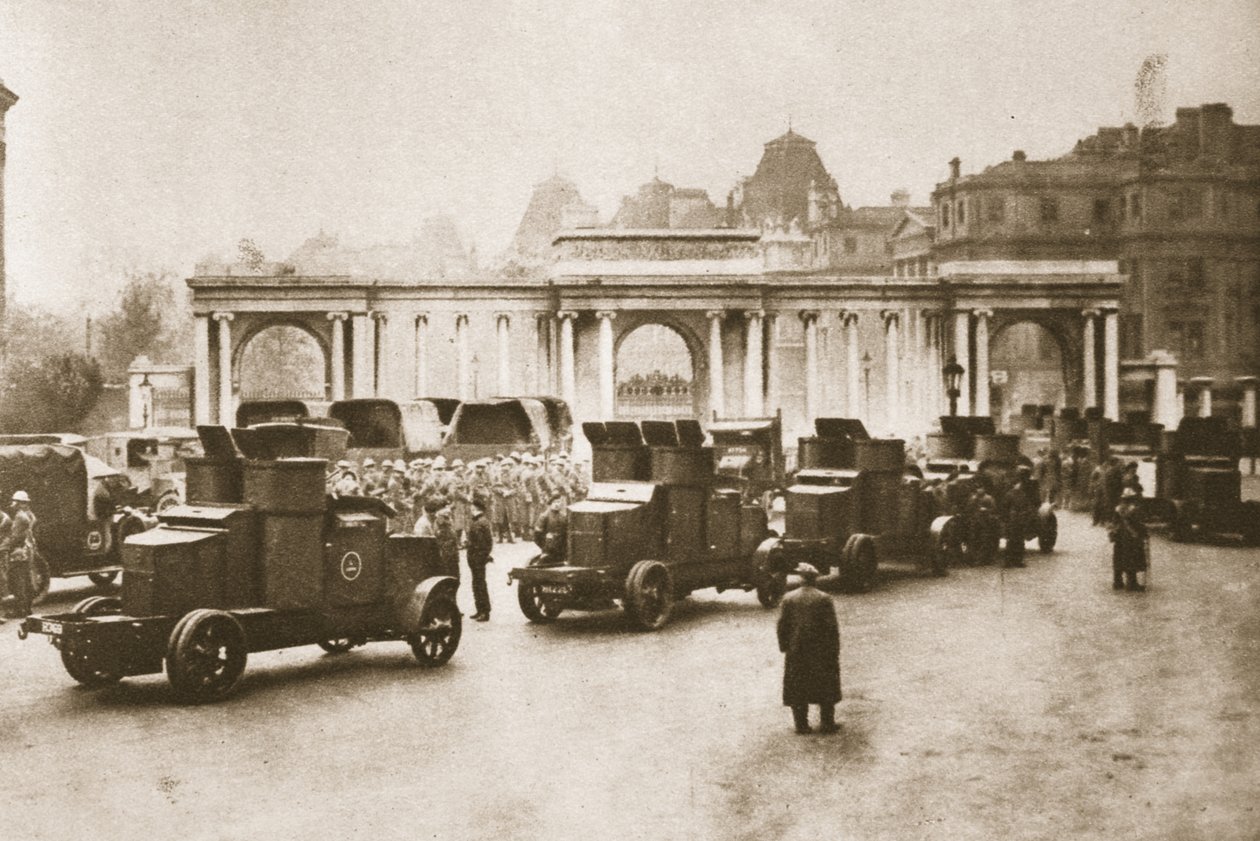 Bus and lorry convoy from the docks to the milk and food dump at Hyde Park escorted by armoured cars during the Great Strike, from Wonderful London, published 1926-27 by English Photographer