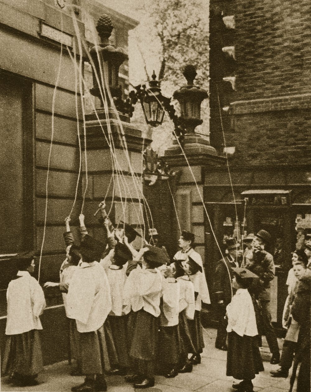 Choir boys of St. Clement Danes marking the boundaries of their parish by English Photographer