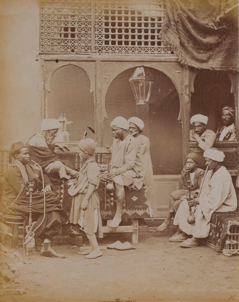 Egyptian Family in a Courtyard, 1893 by English Photographer