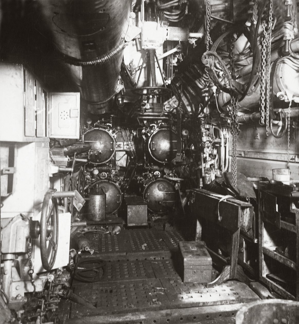 Interior of forward compartment of U-boat 135 showing torpedo and four ...