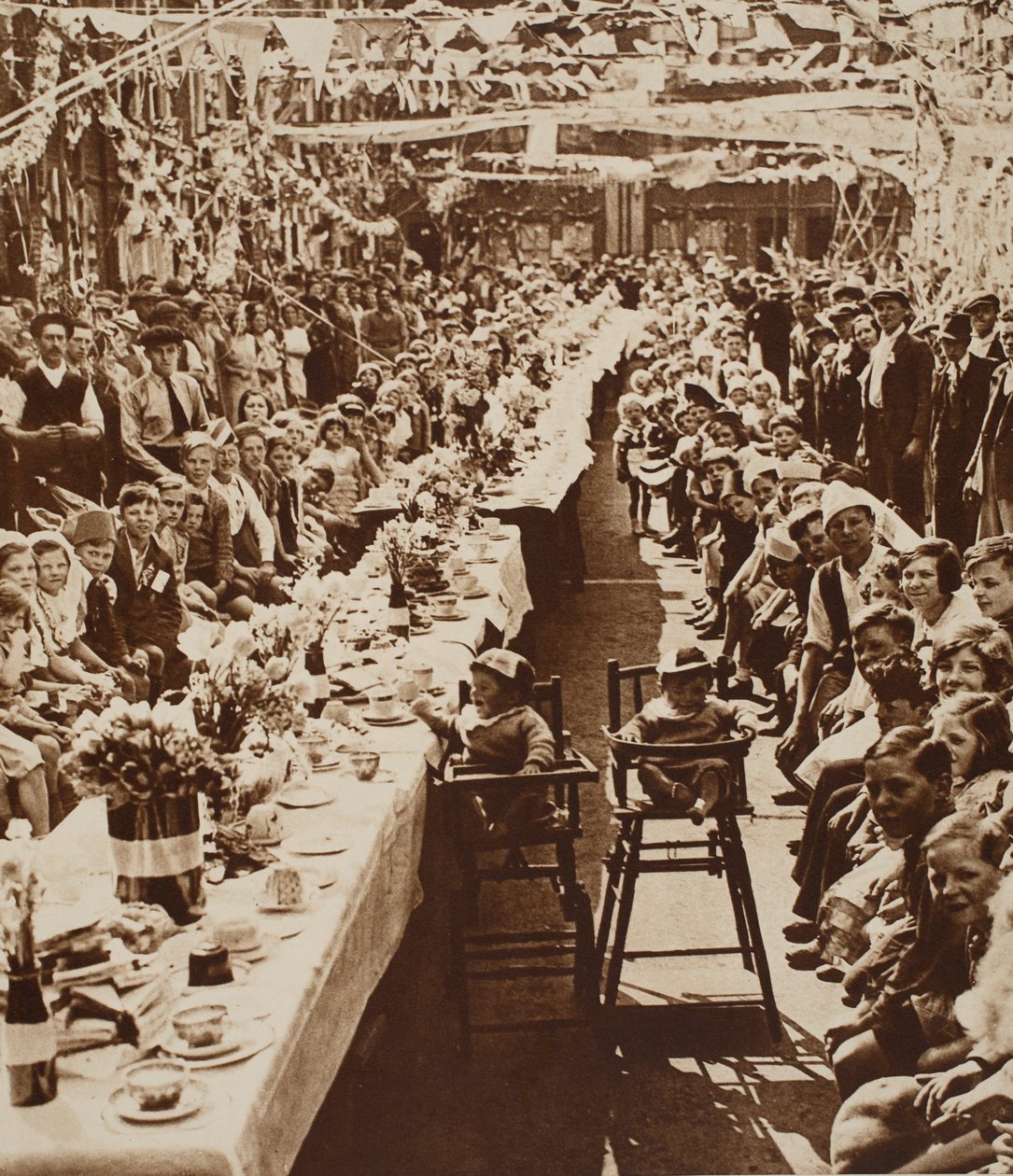 Jubilee Tea Party for Children in Orville Road, Battersea, 1935 by English Photographer