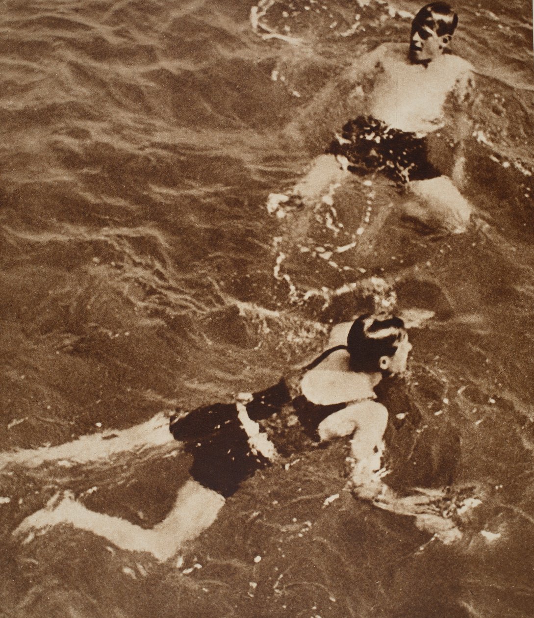 King Edward VIII and the Duke of Kent Swimming on the Riviera, 1933 by English Photographer