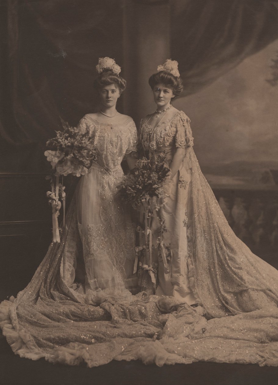 Mrs. Arthur Lee and Miss Faith Moore, American sisters, wearing dress for presentation at the court of Edward VII, c.1905 by English Photographer