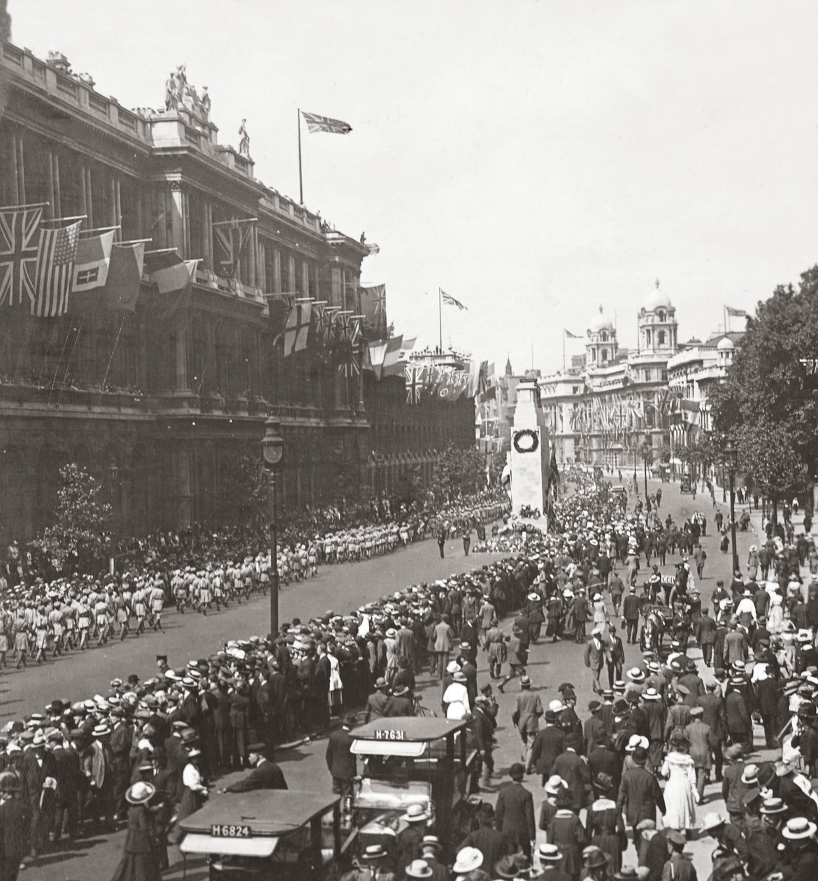 Peace procession of Indian troops saluting the Unknown Warrior at the Cenotaph, Whitehall, 19th July 1919 by English Photographer
