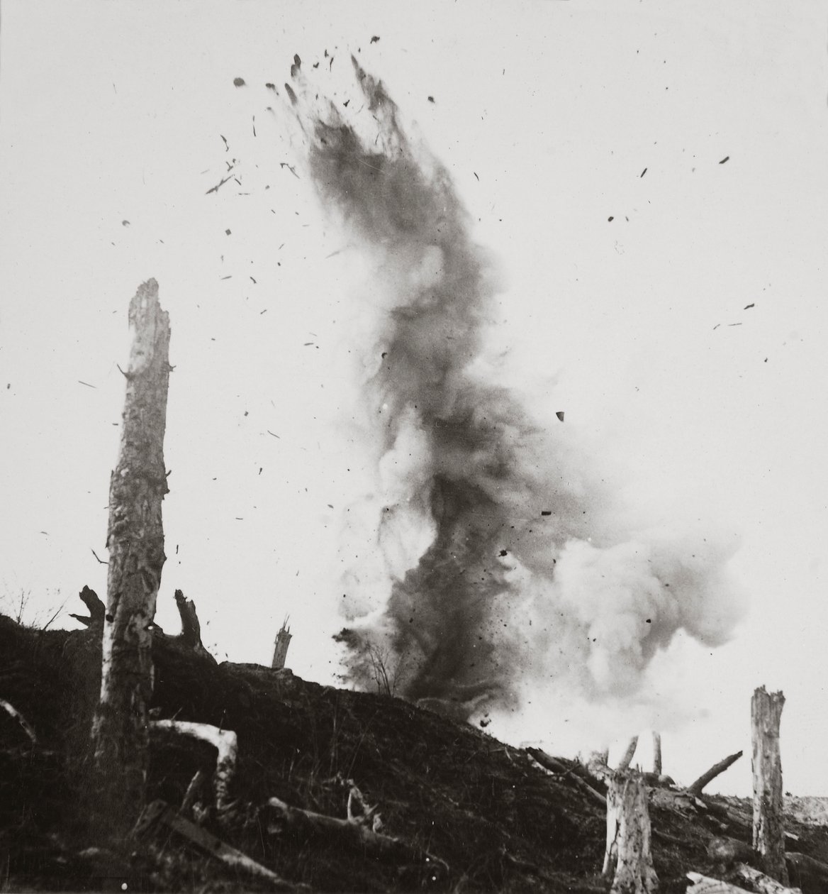 The Bursting of Our High Explosive Shells Which Nothing Could Withstand Shatter the Hun Defences by English Photographer