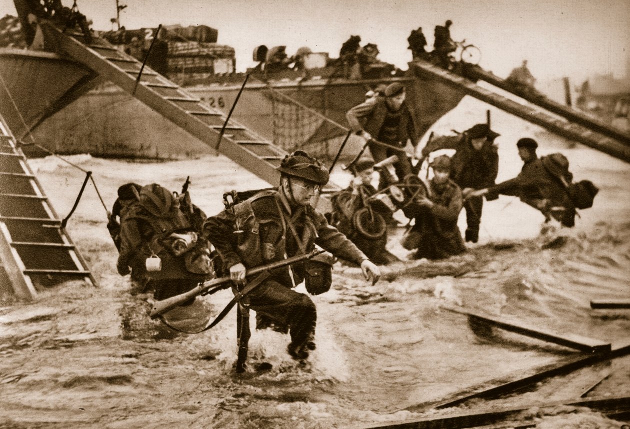 The first British troops disembark from the specially designed landing ladders, 6 June 1944 by English Photographer