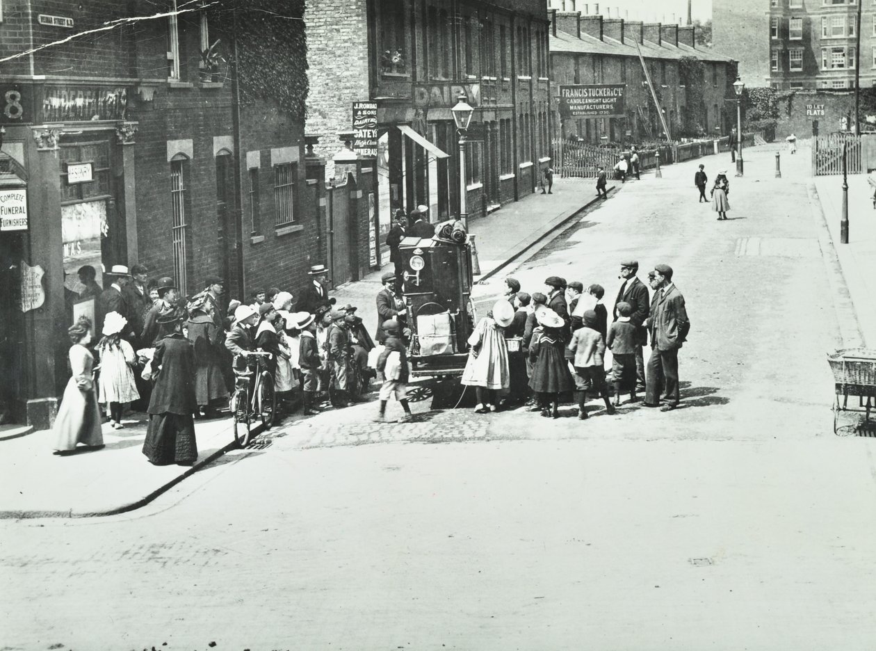 A Street Organist in Putney, London, 1886 by English Photographer