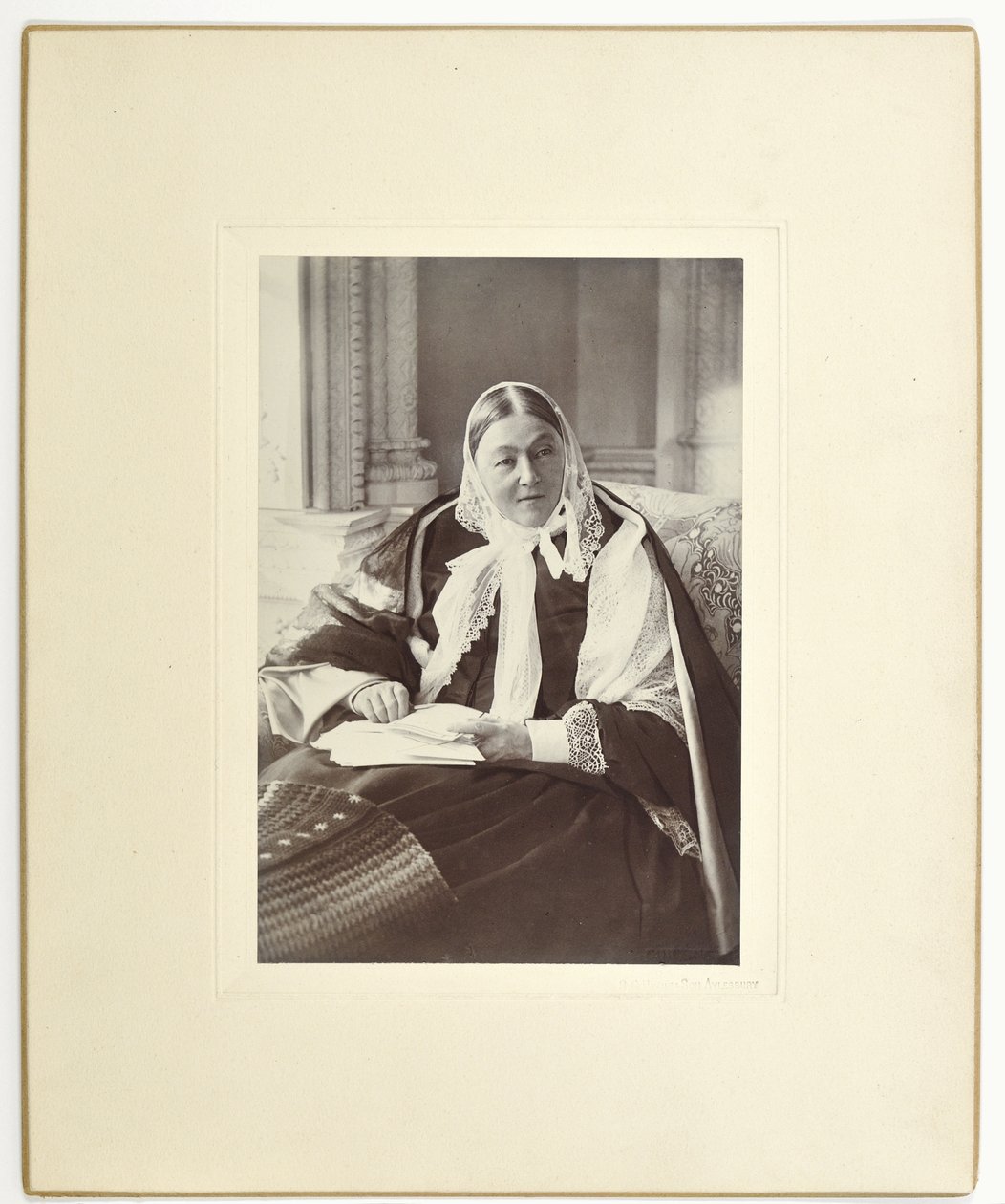Florence Nightingale, seated on a couch in the Blue Room at Claydon House, 1891 by English Photographer