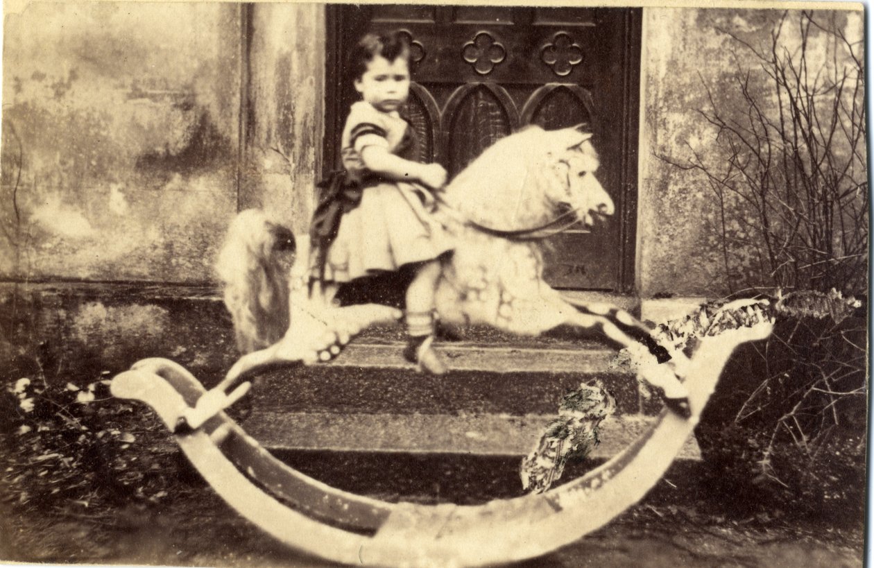Little Girl on a Large Rocking Horse in a Garden, 1860s by English Photographer