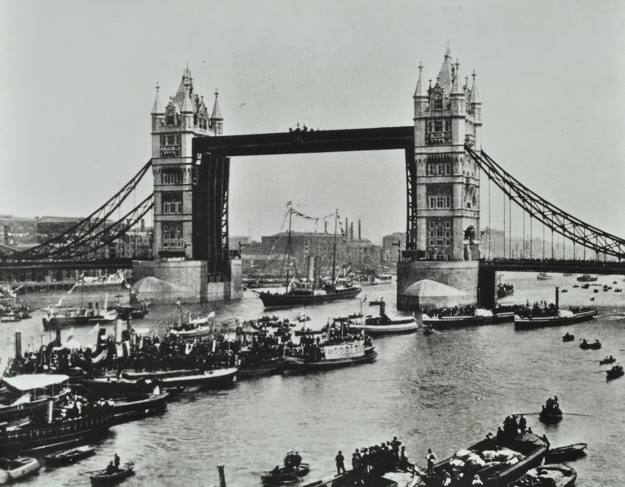 Ships Pass Beneath Tower Bridge, 1894 by English Photographer