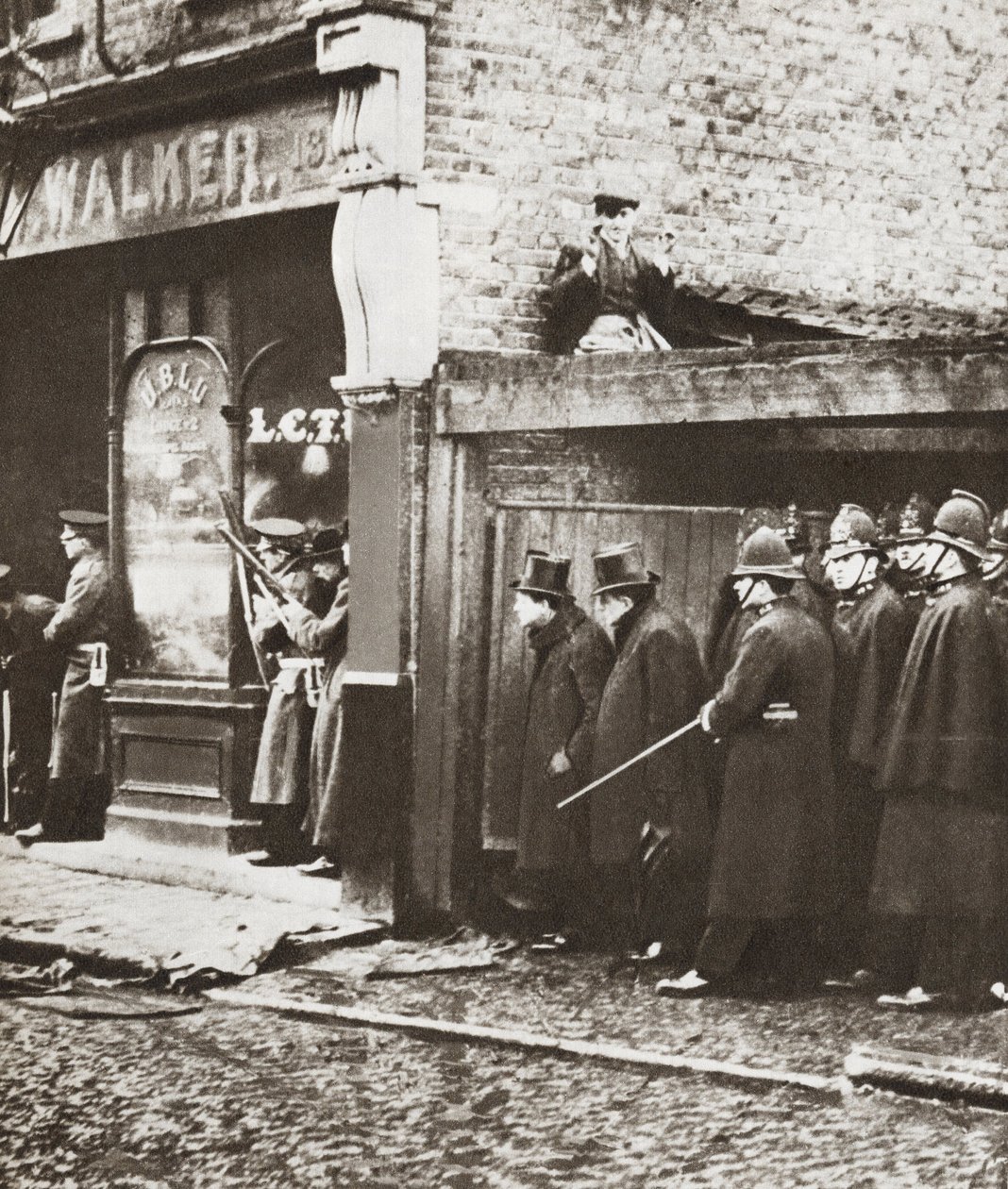 Winston Churchill during the Siege of Sydney Street, London 1911 by English Photographer