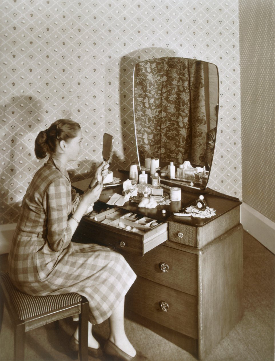 Woman at Her Dressing Table by English Photographer