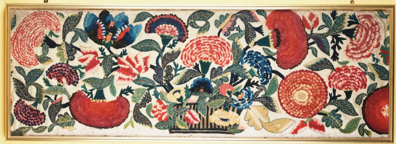 A Felt and Applique Panel with Embroidered Silk Highlights Depicting Carnations, Tulips & Other Flowers Overflowing from a Basket Against an Ivory Wool Ground by English School