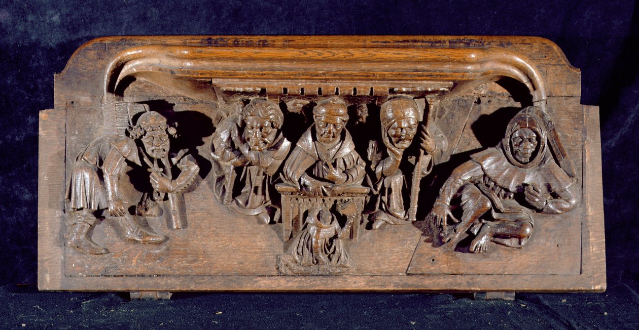 A misericord depicting an academic seated at a panel desk delivering an admonition to a kneeling penitent, New College Chapel, Oxford, late 14th century by English School