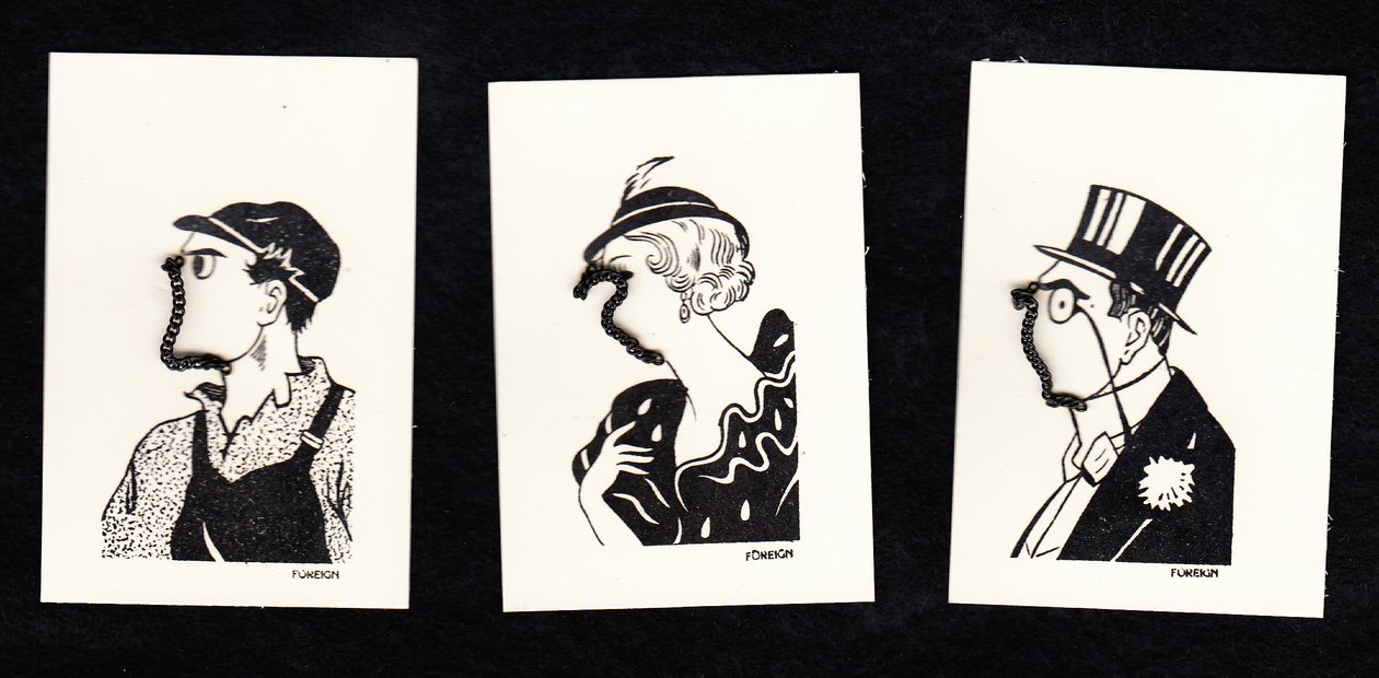 A Novelty Set of Three Cards of Faces of Two Men and a Woman, c.1920 by English School