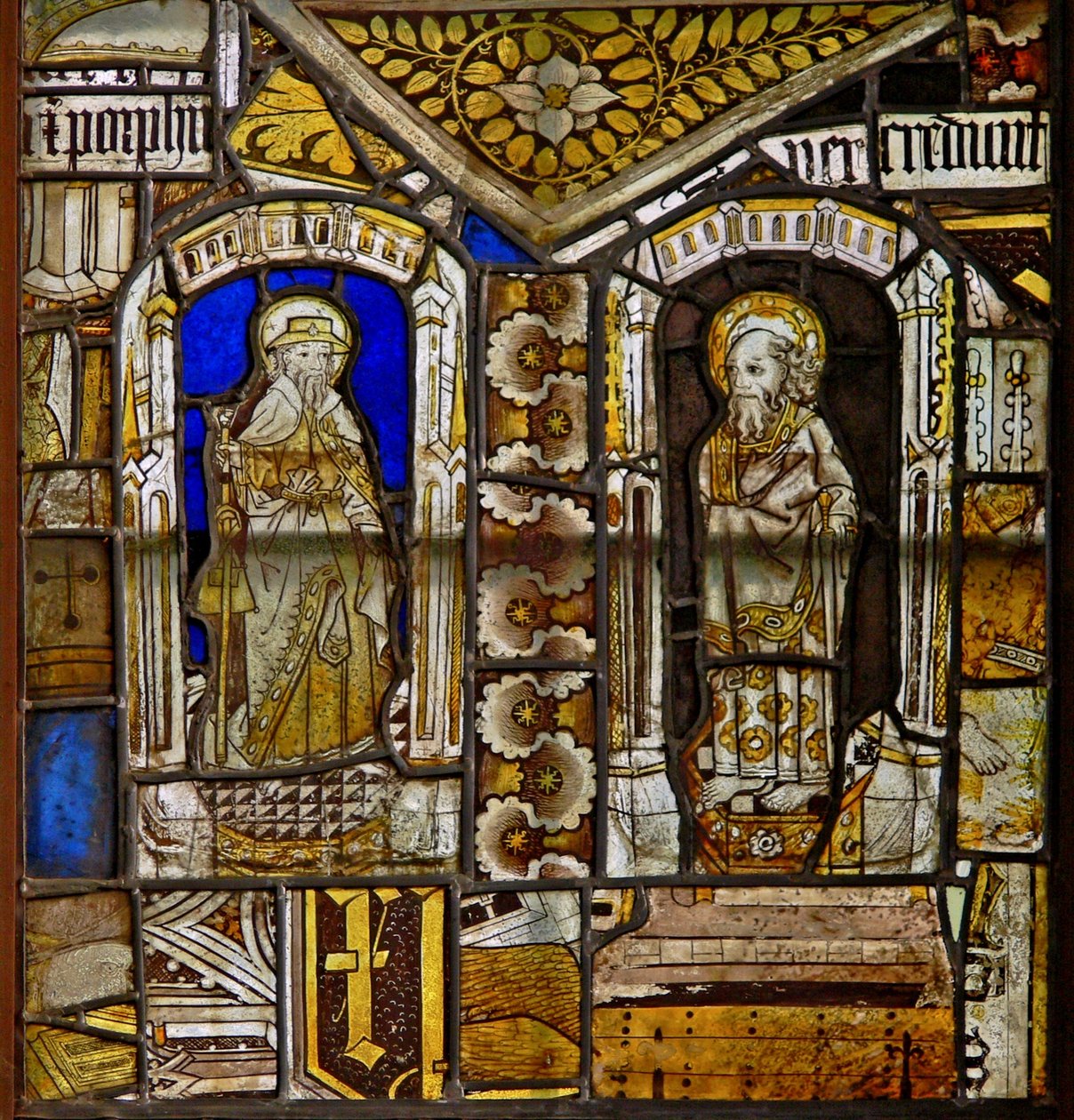 A panel in the east window depicting St James and St Paul with the Gromwell weed above by English School