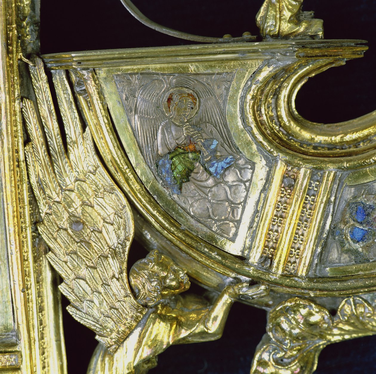 Angel playing a small shawm, detail from the crozier of William of Wykeham by English School