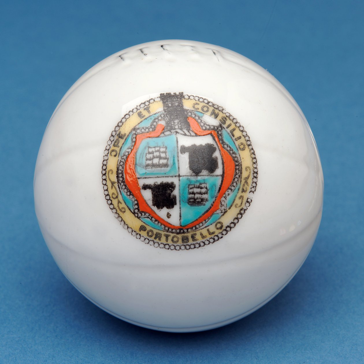Armorial souvenir miniature football with decorative transfer of the Portobello shield (ceramic) by English School