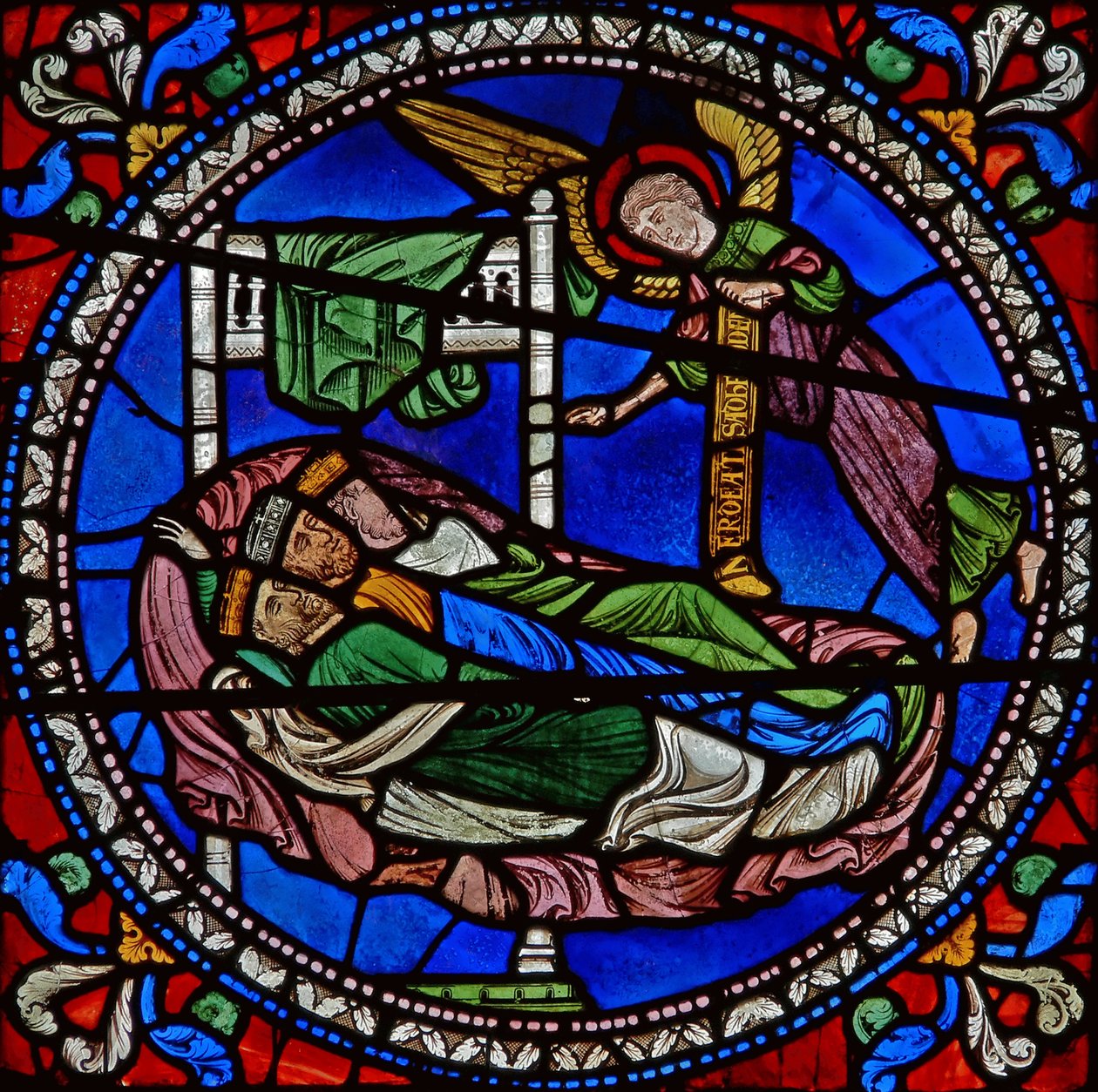 Detail from one of the Bible Windows depicting three Magi kings asleep with an angel by English School