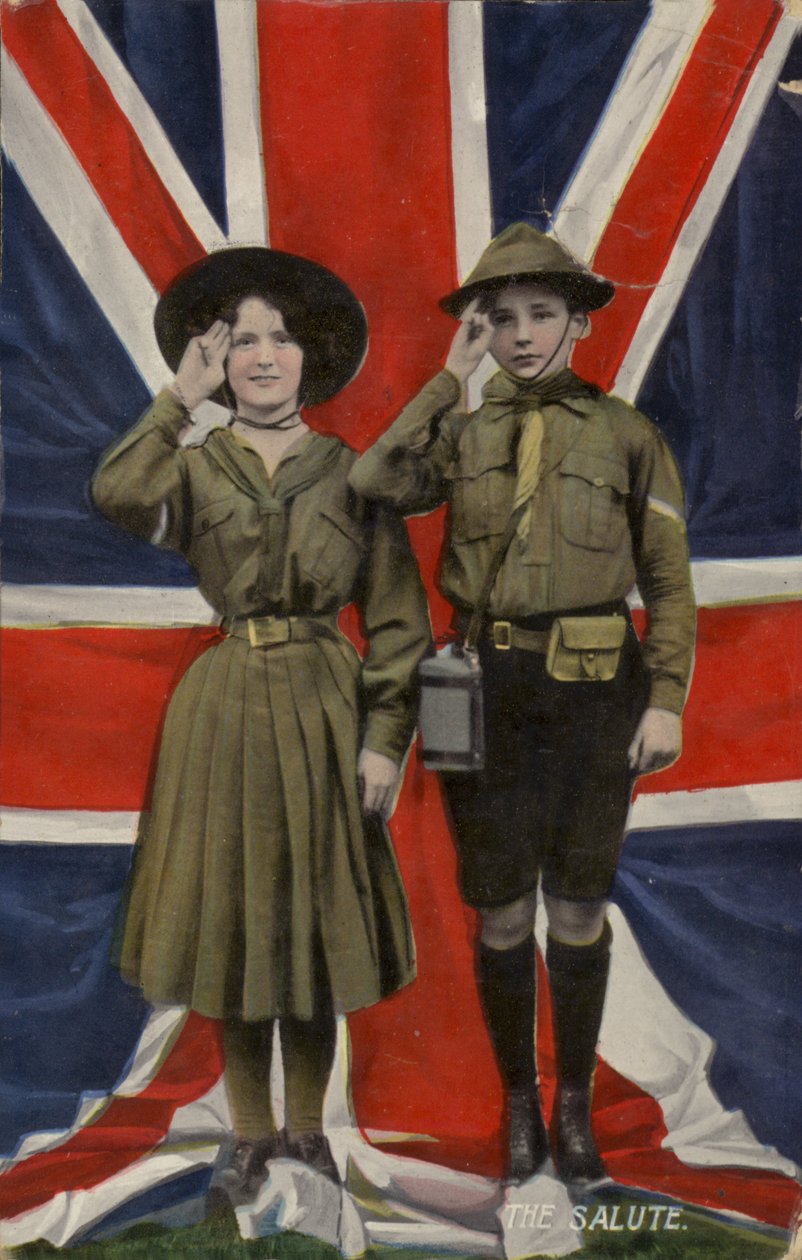 Girl Guide and Boy Scout Saluting in Front of the Union Flag by English School
