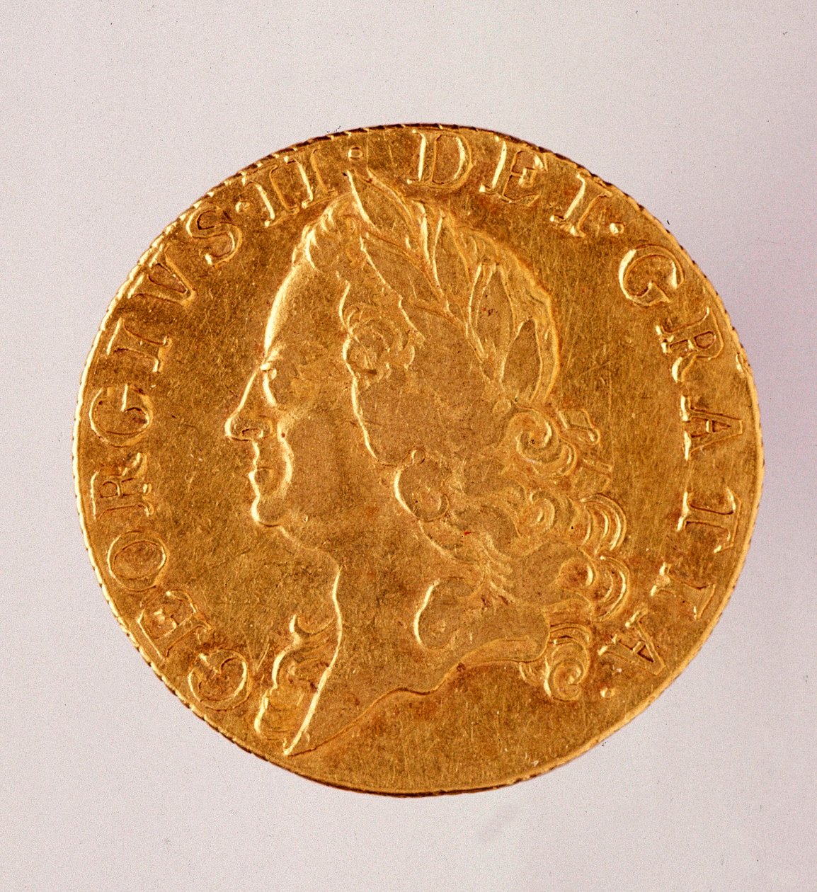 Golden English Guinea, Reign of King George II (1714-1760) 18th Century. Diam. 2.5 cm Naples, Museo Archeologico by English School