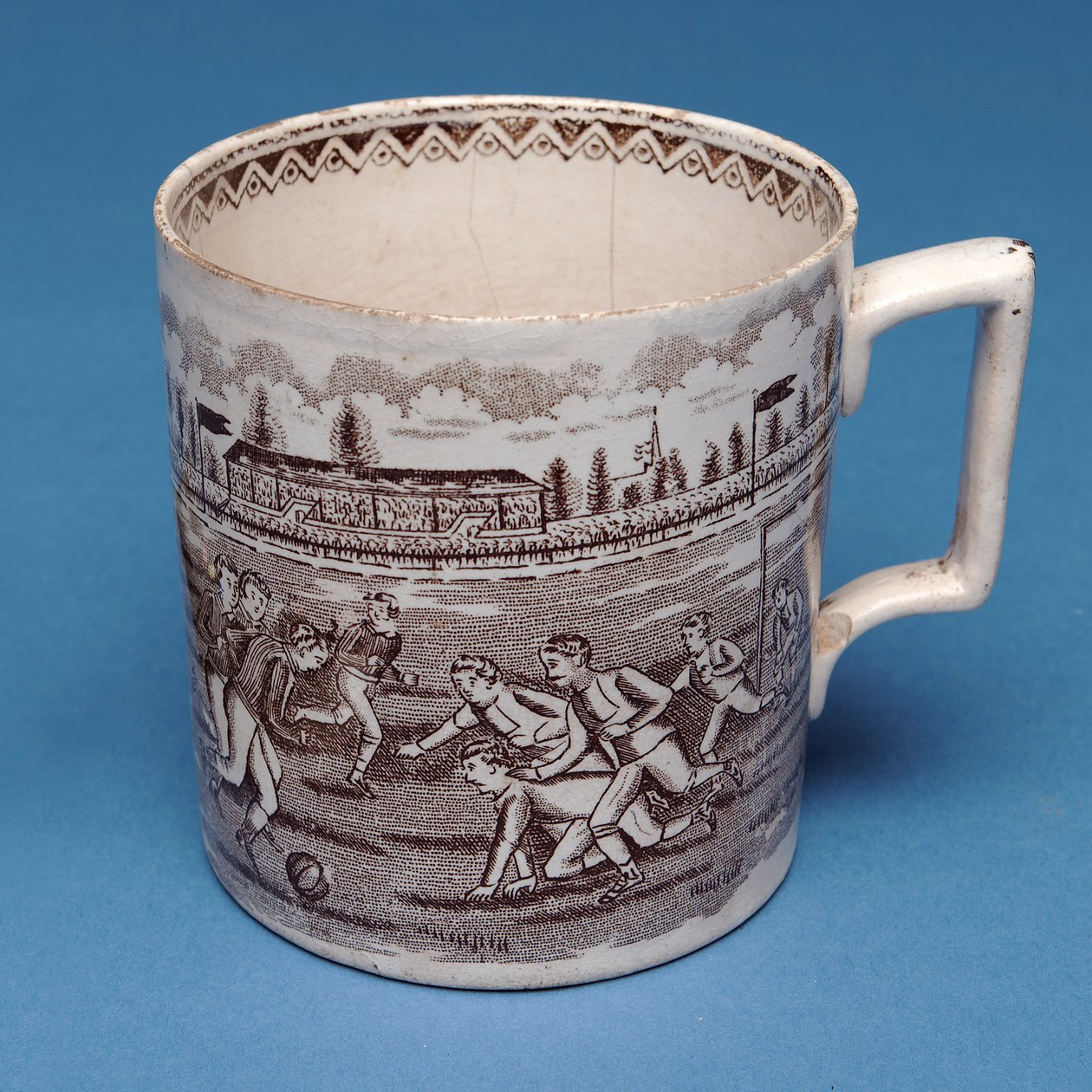 Staffordshire pint mug with sepia transfer of a football match (ceramic) by English School